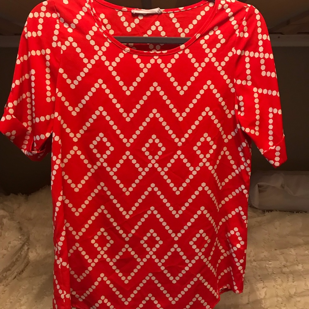 Red patterned blouse